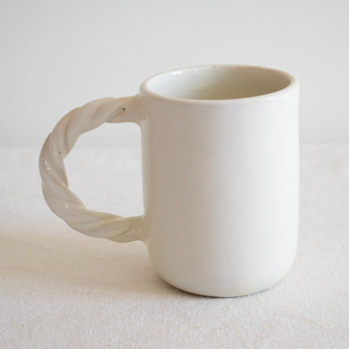 Handcrafted Twisted Handle Ceramic Mug - Apartment F