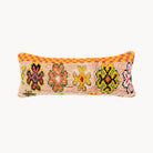 Long Jourdan Moroccan rug lumbar pillow with geometric flower motifs